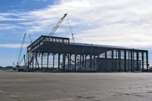 Large-scale PEB steel structure and aircraft hangar construction project executed by M. Siddique Sons Engineering.